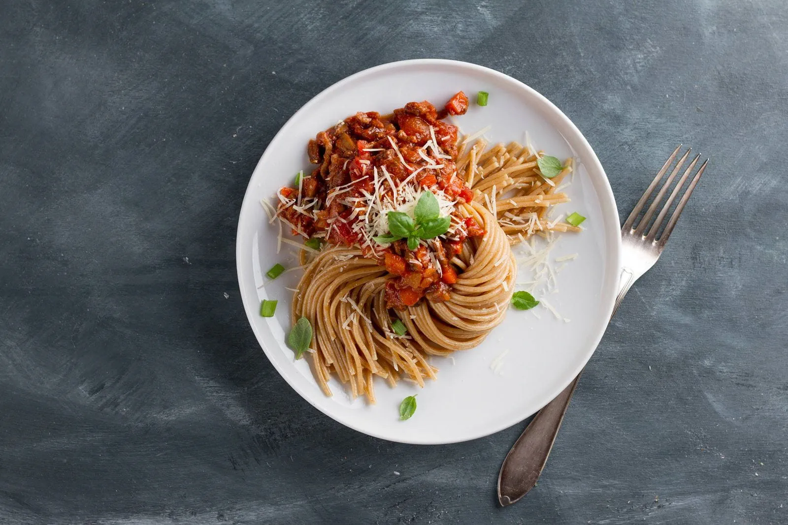 recipe image Spaghetti Bolognese with sundried tomatoes and parmesan