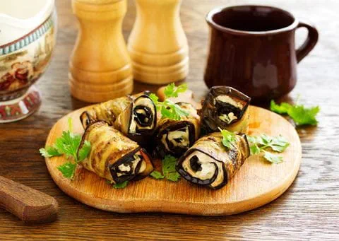 recipe image Aubergine rolls with Parmesan cheese and pine nuts