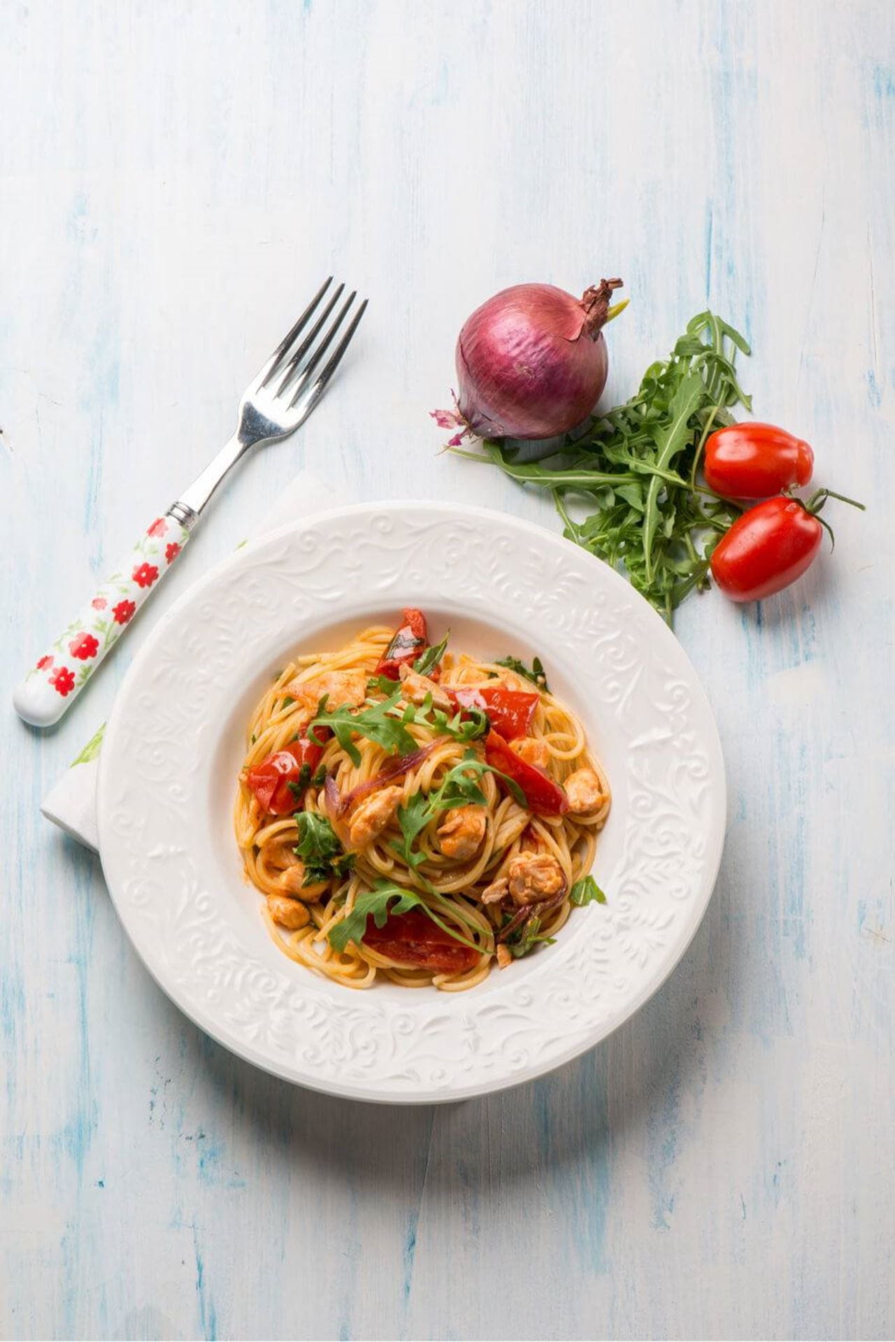recipe image Spaghetti met rucola, walnoten en kerstomaten