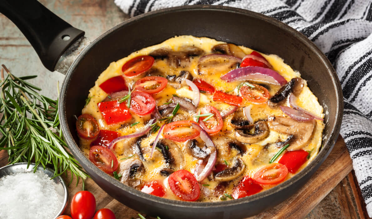 mezelf Anemoon vis behandeling Omelet met tomaten en champignons