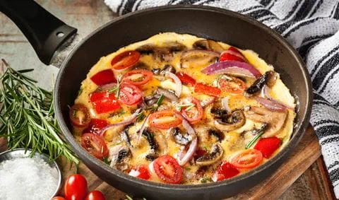 recipe image Omelet met tomaten en champignons